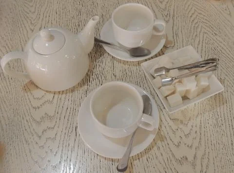 White teaware on the table Stock Photos