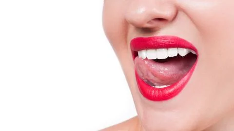 White teeth and red lips. Perfect female smile after bleaching. Dental care a Фото