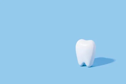 White teeth pattern on a blue paper background. Stock Photos