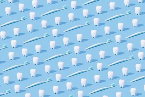 White teeth pattern on a blue paper background. Stock Photos