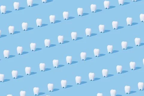 White teeth pattern on a blue paper background. Stock Photos