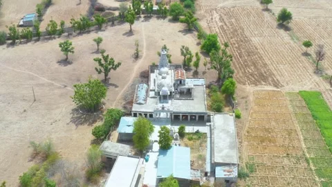 White Temple Complex in Agricultural Zone Video stock 322645428