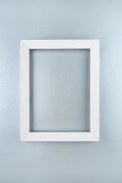 White text frame on a silver background. Stock Photos