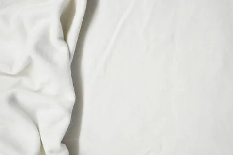 White textile pattern as a background. White material texture on fabric Stock Photos