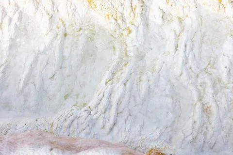 White texture of calcium stone surface along which trickle runs on Pamukkale Stock Photos