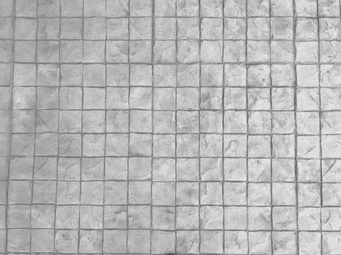 White texture stone pavement background. Square brick block wall pattern. Stock Photos