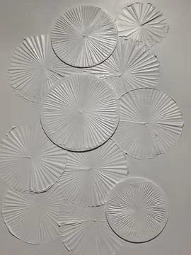 White textured decorative wall with circular abstract pattern Stock Photos
