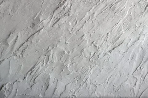 White textured plaster wall surface with handmade decorative finish Foto stock