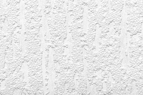 White textured wall as a background. Stock Photos
