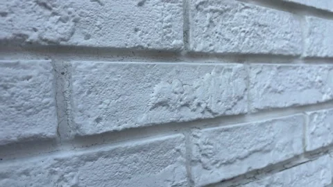 White Textured Wall Slow Diagonal Pan Right Vídeos de archivo 332259664