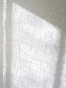 White Textured Wall With Window Or Curtain Shadow Abstract 写真素材