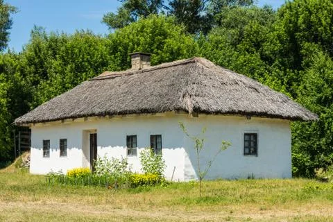 White Thatched Cottage Stock Photos