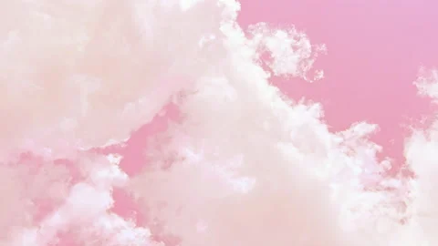 White thick clouds float in the soft pink sky. Stock Footage 197430355