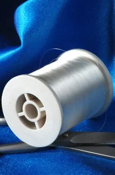 White thread and scissors tailoring Stock Photos