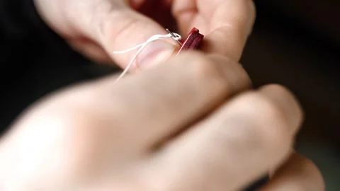 White thread hand stitching leather edge Stock Footage 314961943
