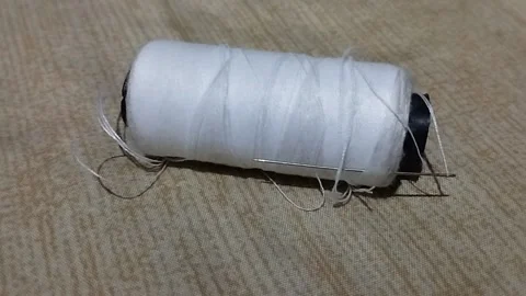 White thread that has not been used for a long time Stock Footage 227225161