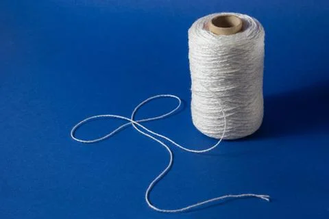 White thread isolated on white background. Rope, wool, knitting homemade Stock Photos