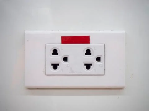 White three electric socket on wall background Stock Photos