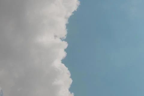 White thunderclouds in blue sky. summer cumulus clouds before rain. Beautiful Stock Photos