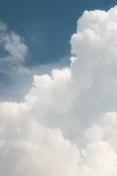 White thunderclouds in blue sky. summer cumulus clouds before rain. Beautiful Stock Photos