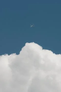 White thunderclouds in blue sky. summer cumulus clouds before rain. Beautiful Stock Photos