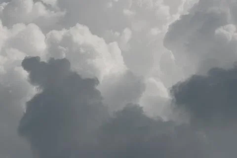 White thunderclouds in blue sky. summer cumulus clouds before rain. Beautiful Stock Photos