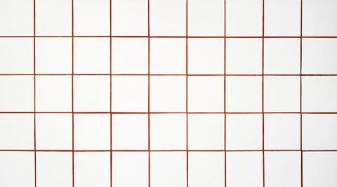 White tile background. Wall with white tiles for the interior of the kitchen or Stock Photos