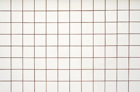White tile background. Wall with white tiles for the interior of the kitchen or Stock Photos
