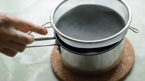 White timer on the kitchen near plant Stock Footage 119821954