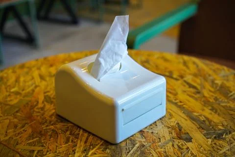 White tissue holder on cafe table Stock Photos