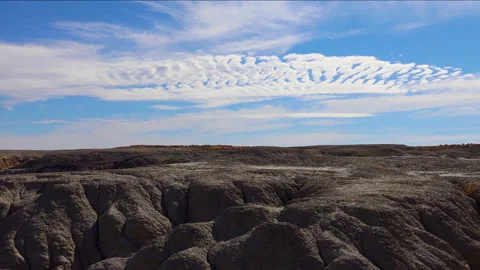 White torn clouds over the desert in Wilderness Study Area, Rock formations a Video stock 166461737
