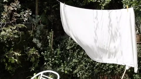 A white towel hanging outside Stock Footage 141151003