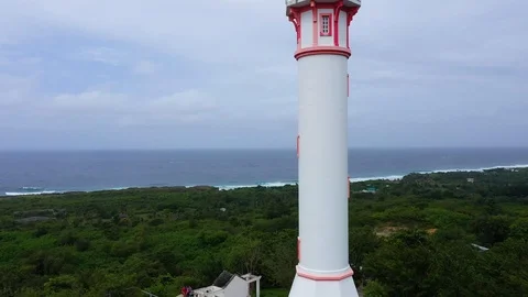White tower lighthouse on a large island, top view. Stock Footage 124834690