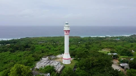 White tower lighthouse on a large island, top view. Stock Footage 251411476