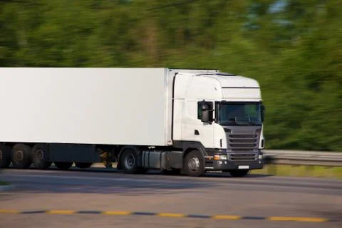 White trailer transporting cargo Stock Photos