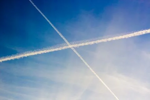 White trails in the sky Stock Photos