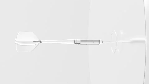 White translucent dart placed on center of translucent dartboard.  Stock Footage 227698939