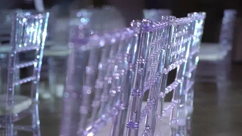 White transparent plastic Chiavari chairs in rows. Indoor wedding ceremony. 스톡 동영상 161114353