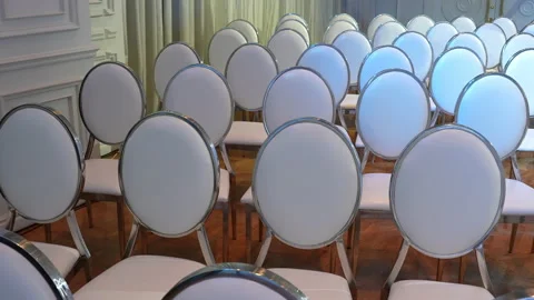 White transparent plastic Chiavari chairs in rows Video stock 236042008
