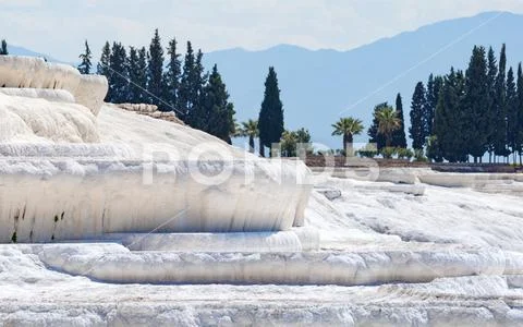 White travertine terrace formations, dry pools in Pamukkale, Turkey Stock Photos