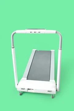 White treadmill on green background Stock Photos