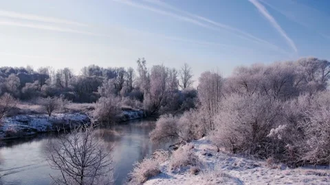 White trees and evaporating river view from a quadcopter Stock Footage 167887246