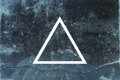 White triangle on dark background Stock Photos