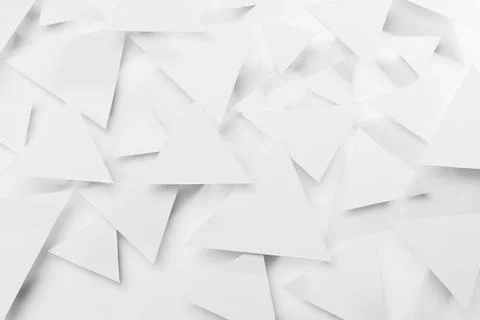 White triangles geometric pattern flying in bright light with soft light shad 写真素材