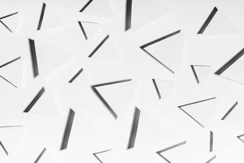 White triangles geometric pattern in hard light with strict black shadows in  写真素材