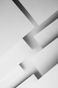 White triangles paper surfaces fly with shadows, stripes, corners as complex  Foto stock