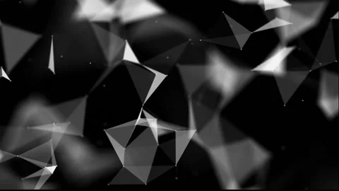 White triangular particles move slowly against a black background. black and whi Stock-Footage 95130746