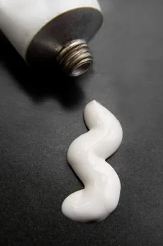 White tube with toothpaste Stock Photos