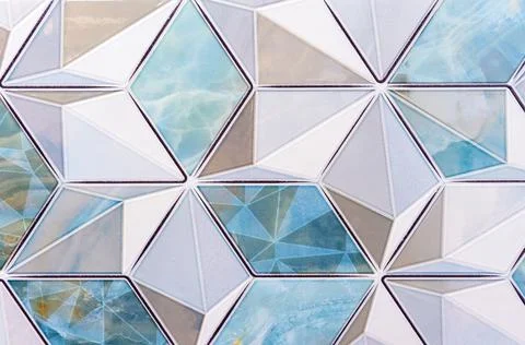 White-turquoise ceramic tile with 3D rhombus pattern. Tile background. Stock Photos