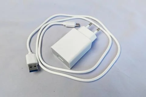 White Type-C charger head and cable white background Stock Photos